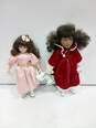 Bundle of 2 Assorted Girl Porcelain Dolls image number 1