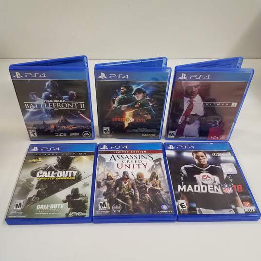 Buy the Resident Evil 5 & Other Games - PlayStation 4 | GoodwillFinds