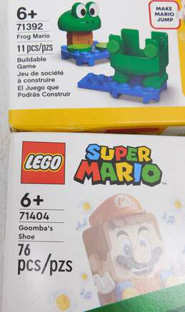 Minecraft & Mario Factory Sealed Sets 21167: The Trading Post 71404: Goomba's Shoe & 71392: Frog Mario Power-Up Pack alternative image