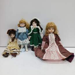 Bundle of 4 Assorted Porcelain Dolls