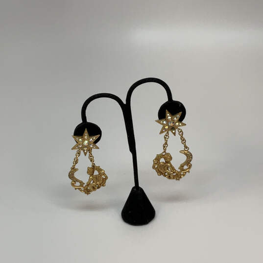 Designer Kirks Folly Gold-Tone Rhinestones Clip On Star Dangle Earrings image number 1