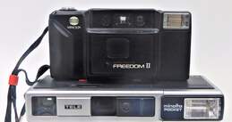 Minolta Freedom II Auto Focus 35mm Point Shoot & Pocket Autopak 460TX 110 Film Cameras
