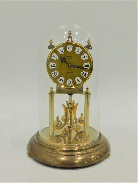 KUNDO Quartz Rotating Pendulum Carriage Anniversary Clock West Germany Vintage image number 1