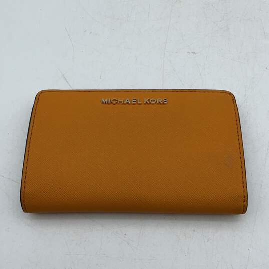 Michael Kors Womens Yellow Leather Credit Card Slots Zipper Pocket Bifold Wallet image number 1