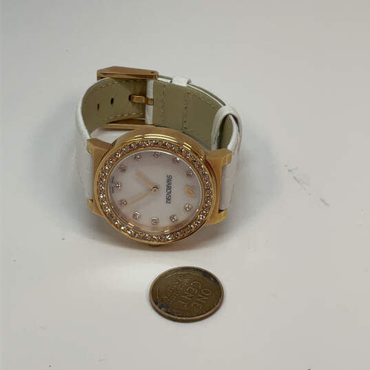 Designer Swarovski Gold-Tone Rhinestone Adjustable Strap Analog Wristwatch image number 3