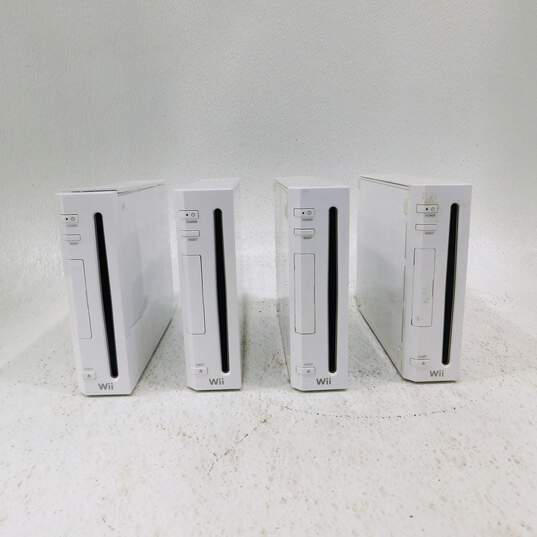 Lot of 4 nintendo wii consoles only image number 1
