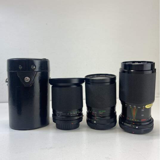 Lot of 4 Assorted Canon FD Compatible Zoom Lenses image number 1
