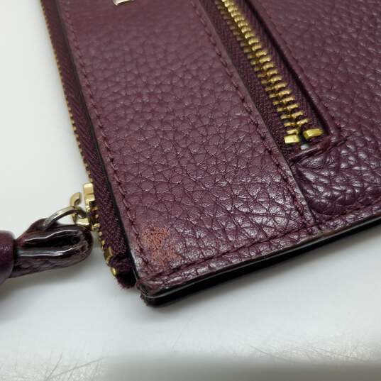 Kate Spade Cobble Hill Bee Burgundy Red Pebbled Leather Wristlet image number 4