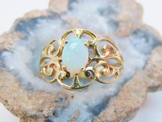14K Gold Opal Oval Cabochon Open Scrolled Band Ring 3.5g image number 1