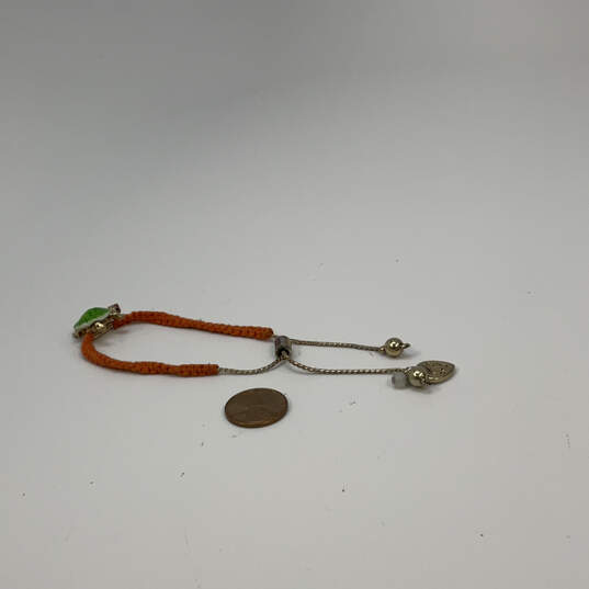 Designer Betsey Johnson Silver-Tone Green Turtle Braided Charm Bracelet image number 1