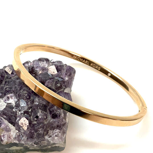 Designer Michael Kors Gold-Tone Round Shape Classic Bangle Bracelet image number 1
