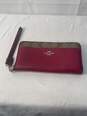 Certified Authentic Coach Wine Color Wristlet image number 1