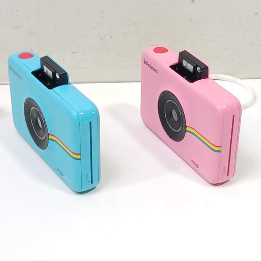 Pair Of Polaroid Snap Touch Compact Digital Cameras w/ Cases image number 2