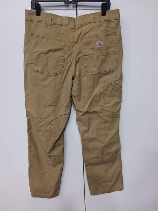 Men's Carhartt Brown Work Jeans Size 34X32 image number 2