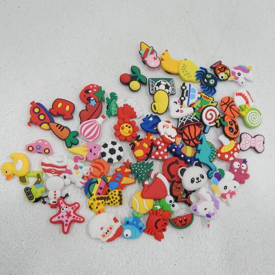 Lot of 62 Various Shoe Charms Unbranded Holidays Foods Animals Sports & More image number 1