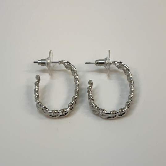 Designer Kendra Scott Silver-Tone Screw Back Twisted Hoop Earrings image number 1