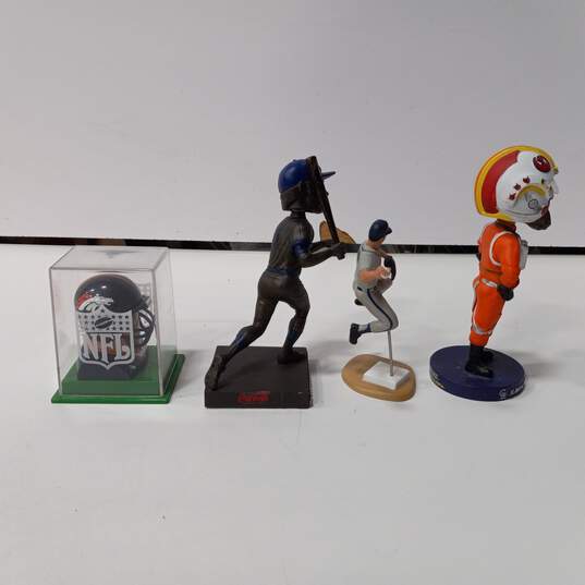 4pc. Bundle of Sports Figurines image number 4