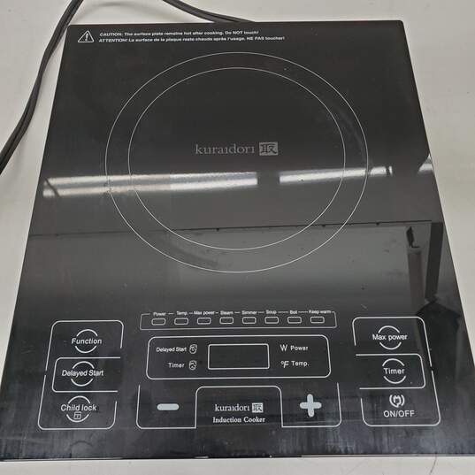 Kuraidori Portable Induction Cooktop 1800 Watts Powers ON image number 1