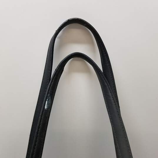 Buy the Michael Kors Jet Set Top-Zip Monogram Tote Bag Black