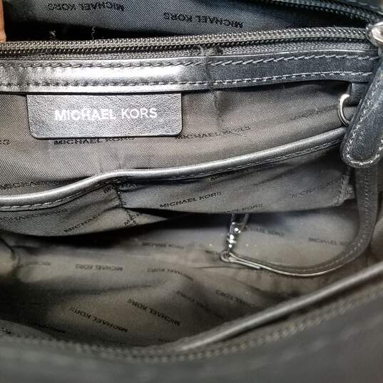 Buy the Michael Kors Jet Set Top-Zip Monogram Tote Bag Black