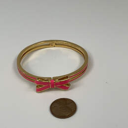 Designer Kate Spade Gold-Tone Fashionable Pink Bow Hinged Cuff Bracelet alternative image