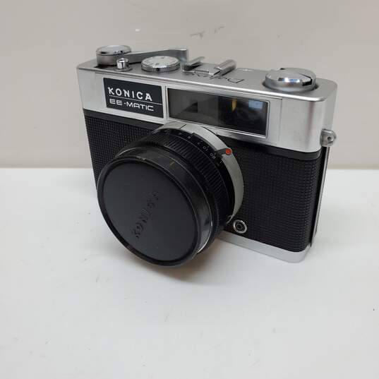 Konica EE-Matic Deluxe Rangefinder 35mm Film Camera 40mm f2.8 Lens & Leather Case image number 1