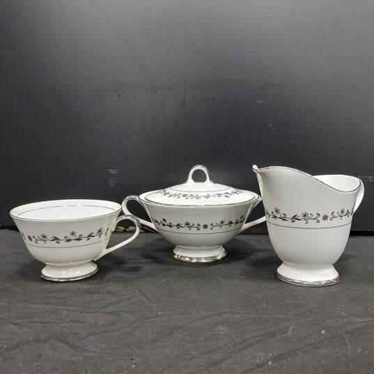 Bundle of 5 Arlen Fine China Tea Cups w/Matching Pair of Creamers and Plates image number 5