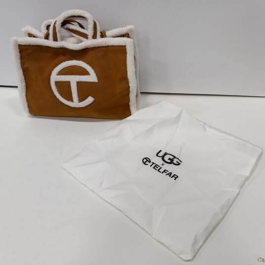 Ugg x Telfar Brown And White Fur Lined Shoulder Bag In White Bag image number 1