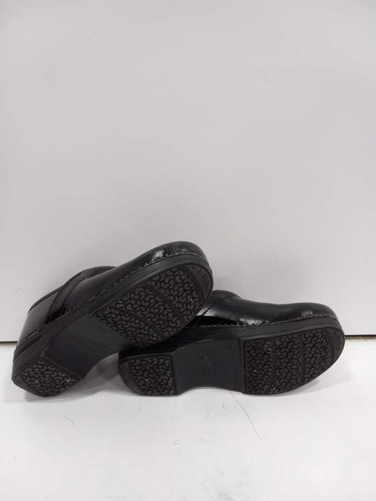 Dansko Black Patent Leather Clogs Women's Size 40/US Size 9 image number 5