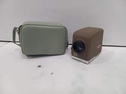 Minolta Mini 35 Slide Projector In Green Carrying Case