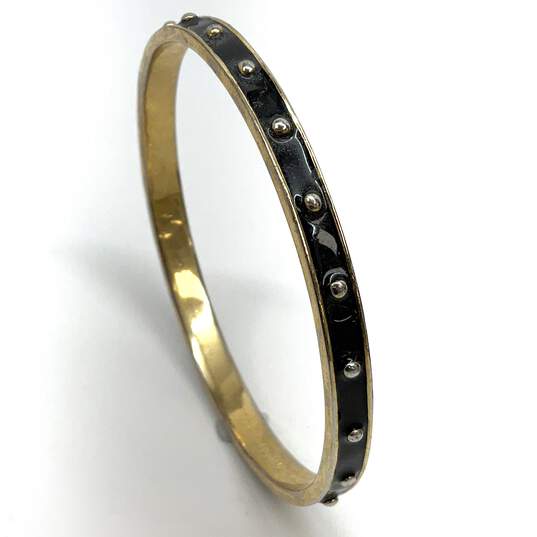 Designer Kate Spade Gold-Tone Black Fashionable Rivet Bangle Bracelet image number 3