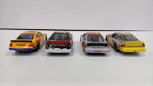 Bundle of 4 Assorted Racing Champions Toy Cars image number 5