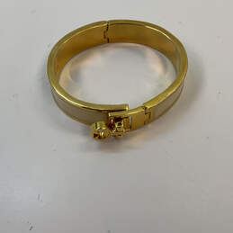 Designer Kate Spade New York Gold-Tone Fold Over Clasp Bangle Bracelet alternative image