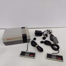 Vintage NES Game Console with Setup Cables & Two Controllers