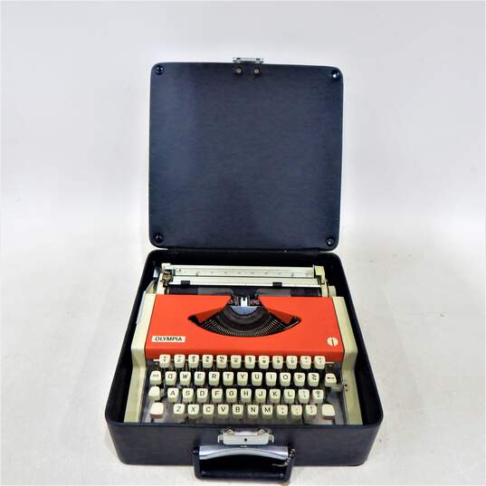 1969 Olympia Traveller De Luxe Cursive Script Orange Typewriter w/ Case image number 1