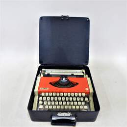 1969 Olympia Traveller De Luxe Cursive Script Orange Typewriter w/ Case