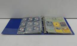 Bundle of Pokemon Trading Cards in Binder