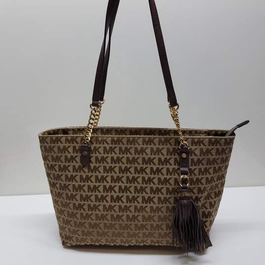 Buy the Michael Kors Brown Canvas Tote Purse