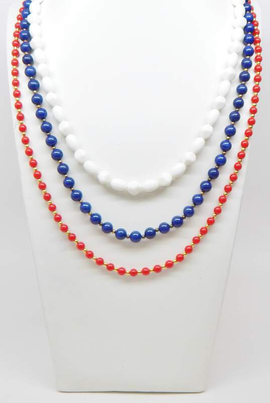 Vintage & Trifari Goldtone Americana Red White & Blue Plastic Beaded Layering Necklaces 84.8g image number 1