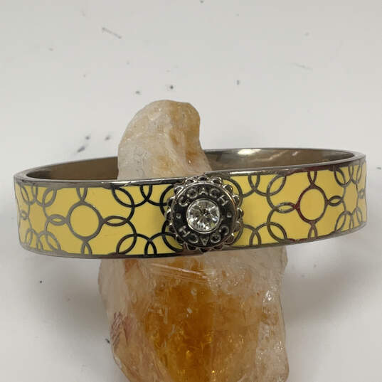 Designer Coach Silver-Tone Crystal Cut Stone Hinged Bangle Bracelet image number 1