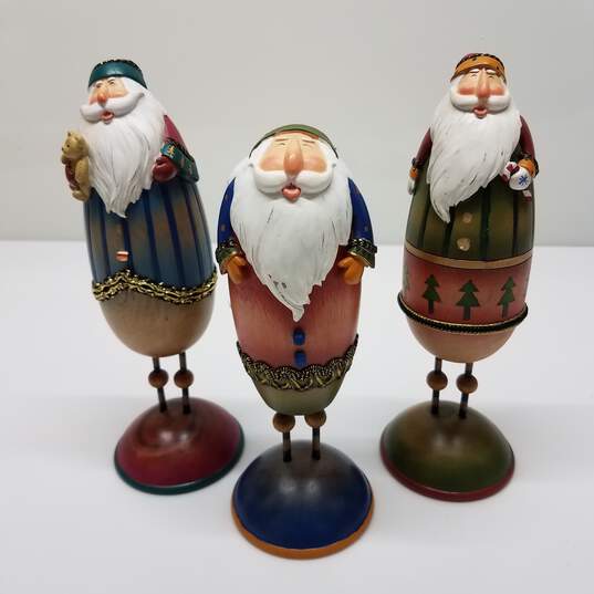 Lot of Folk Art Santa Wooden Figurines image number 1