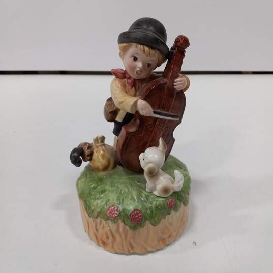 Vintage Music Box Boy playing Cello image number 1