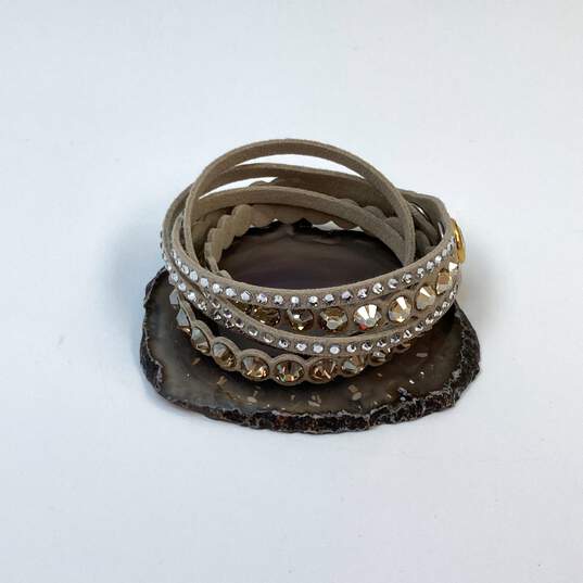 Designer Swarovski Slake Beige Dot Crystal Cut Leather Wrap Bracelet image number 1
