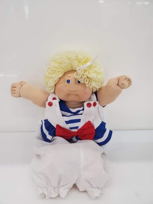 Blonde Yarn Hair Blue-Eyed Cabbage Patch Doll image number 1
