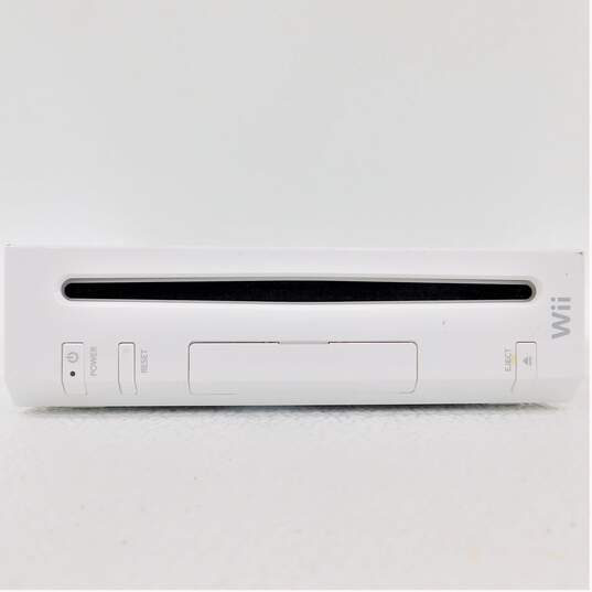 Nintendo Wii w/ 2 controllers, 3 nunchucks, 2 games image number 7