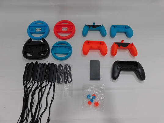 Various Nintendo Switch Joy Con Grips and Accessories image number 1
