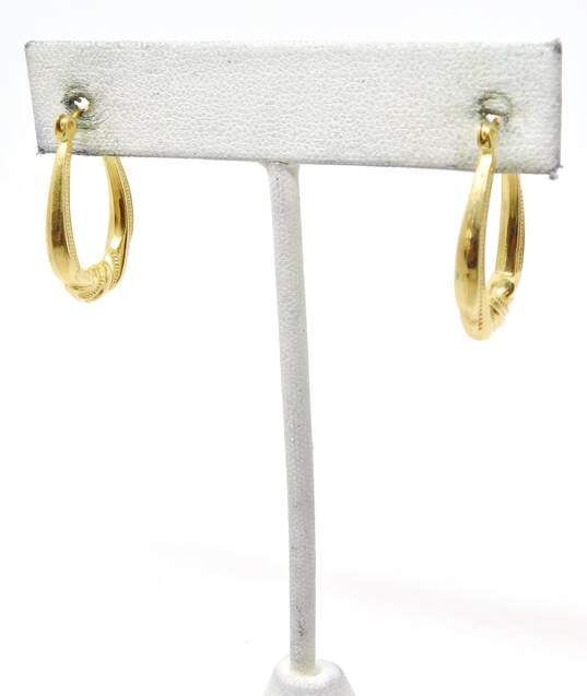 14K Yellow Gold Textured Oblong Hoop Earrings 1.7g image number 3