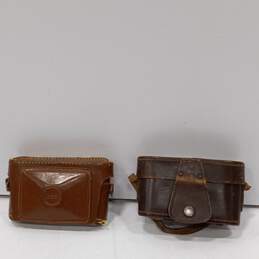 Bundle of Two Vintage Kodak Film Cameras w/ Leather Covers alternative image