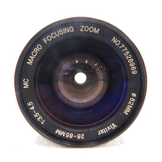 Canon AE-1 Program 35mm Film Camera w/ 3 Lens, Lens Converter, Flash & Bag image number 22
