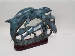 Metal Dolphins Sculpture on Wooden Base 20x15x8 alternative image